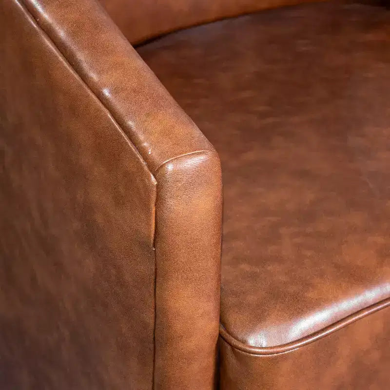 Fauteuil crapaud pivotant et capitonné