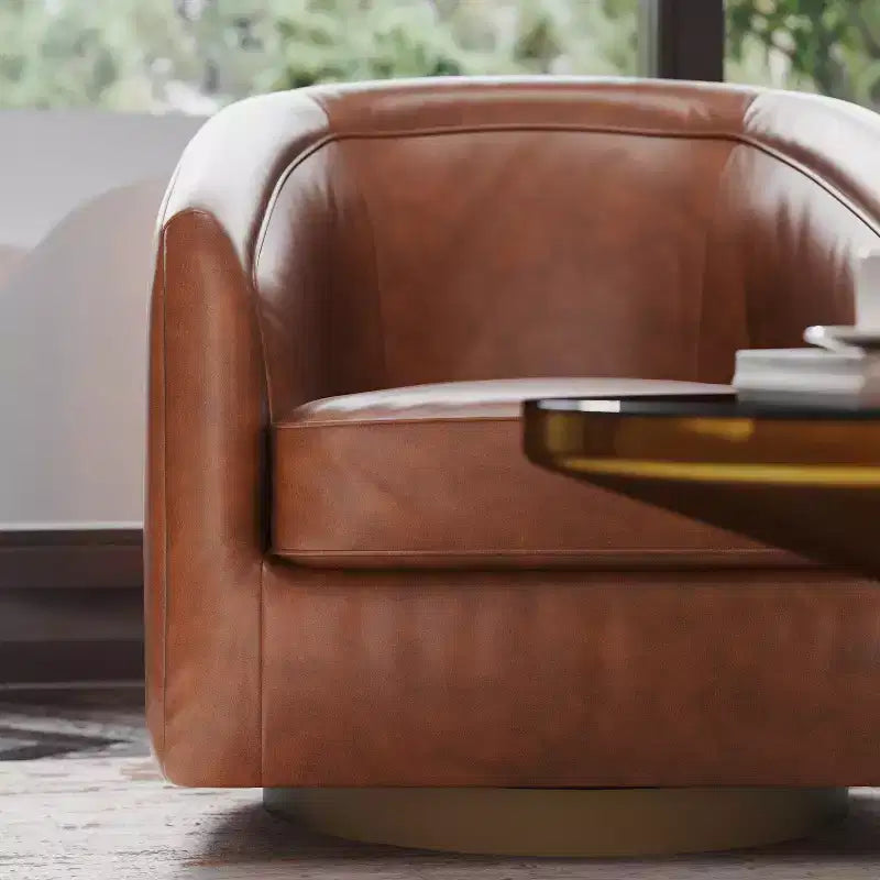 Fauteuil crapaud pivotant et capitonné