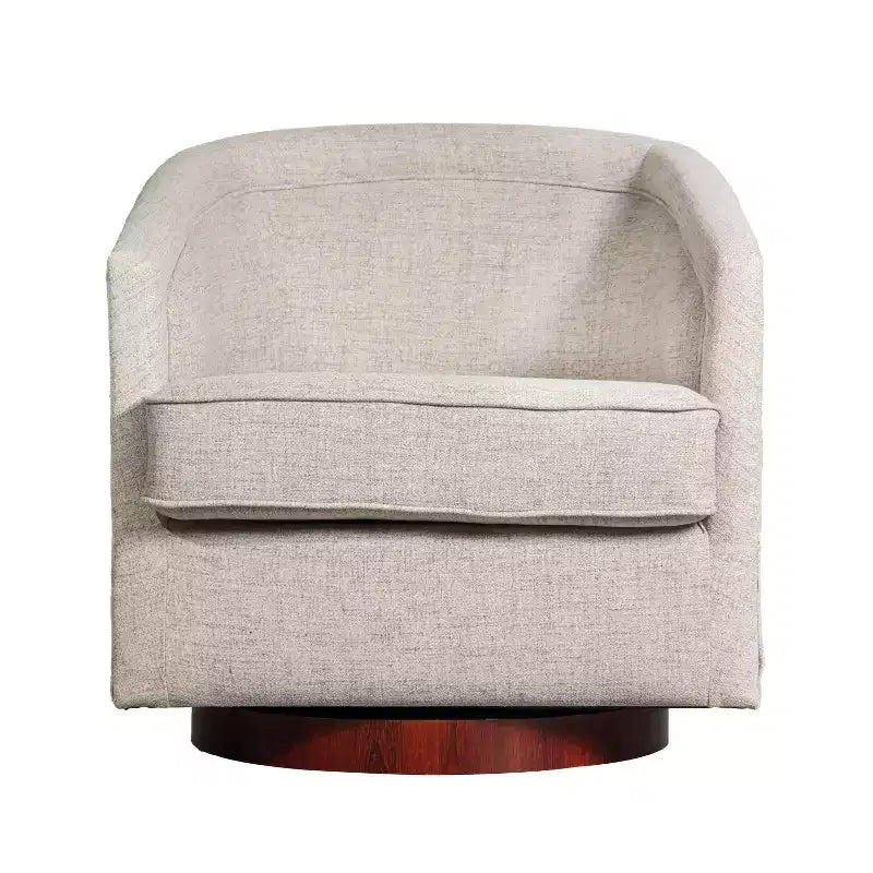 Fauteuil crapaud pivotant et capitonné