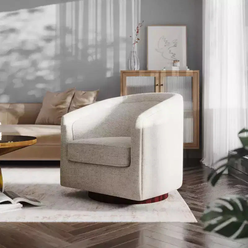 Fauteuil crapaud pivotant et capitonné