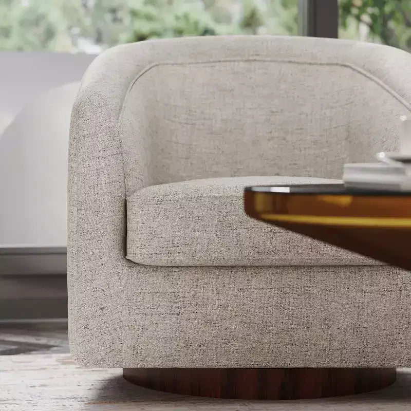 Fauteuil crapaud pivotant et capitonné