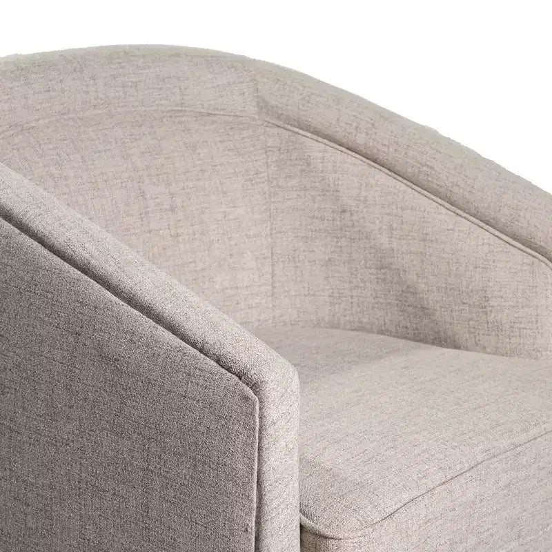 Fauteuil crapaud pivotant et capitonné