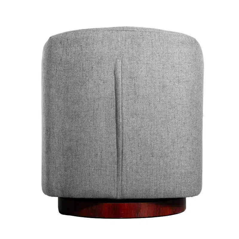 Fauteuil crapaud pivotant et capitonné