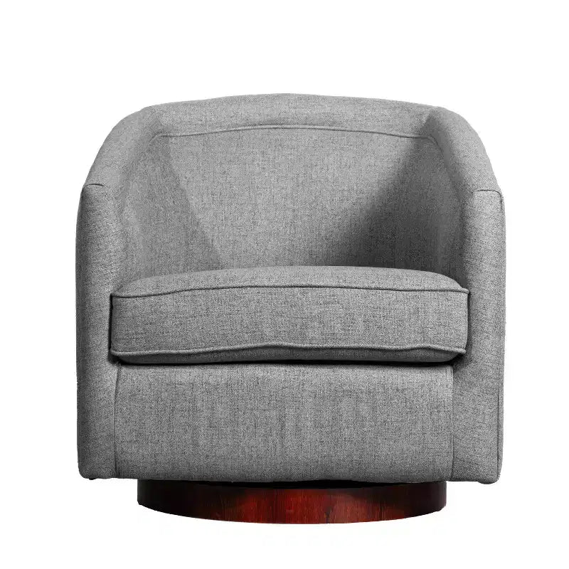 Fauteuil crapaud pivotant et capitonné