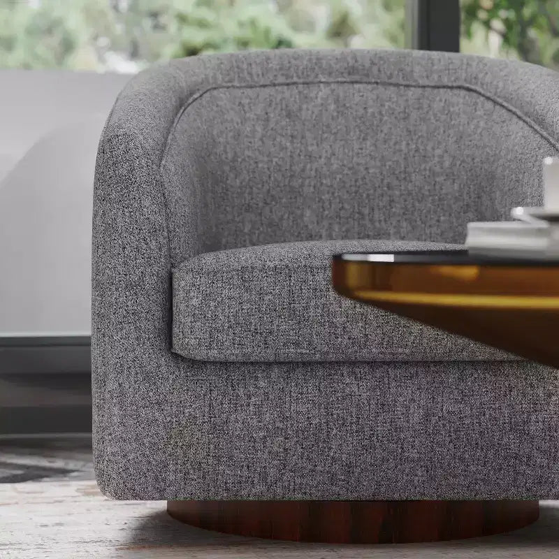 Fauteuil crapaud pivotant et capitonné