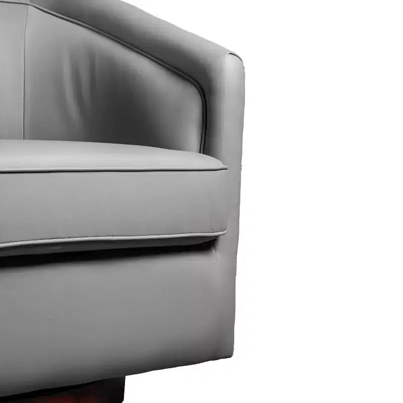 Fauteuil crapaud pivotant et capitonné