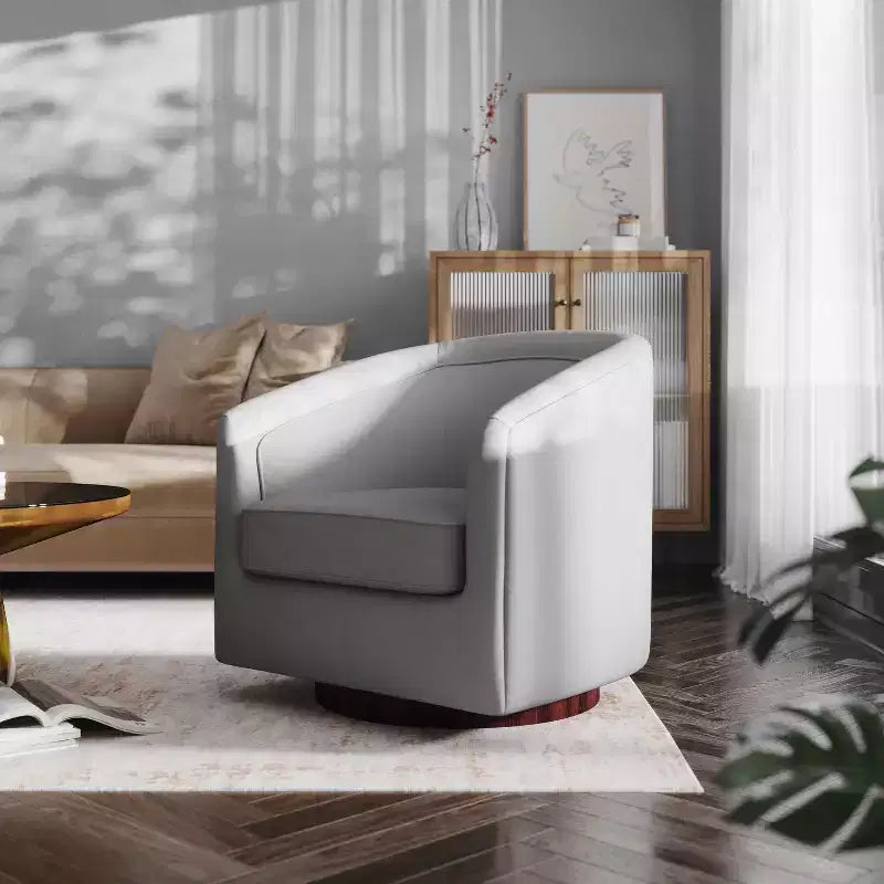 Fauteuil crapaud pivotant et capitonné