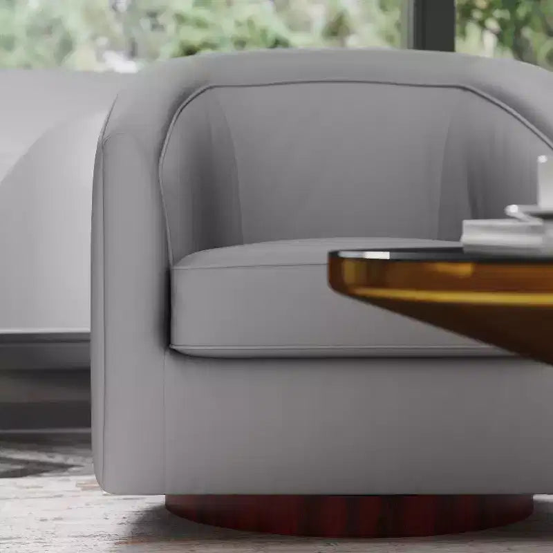 Fauteuil crapaud pivotant et capitonné