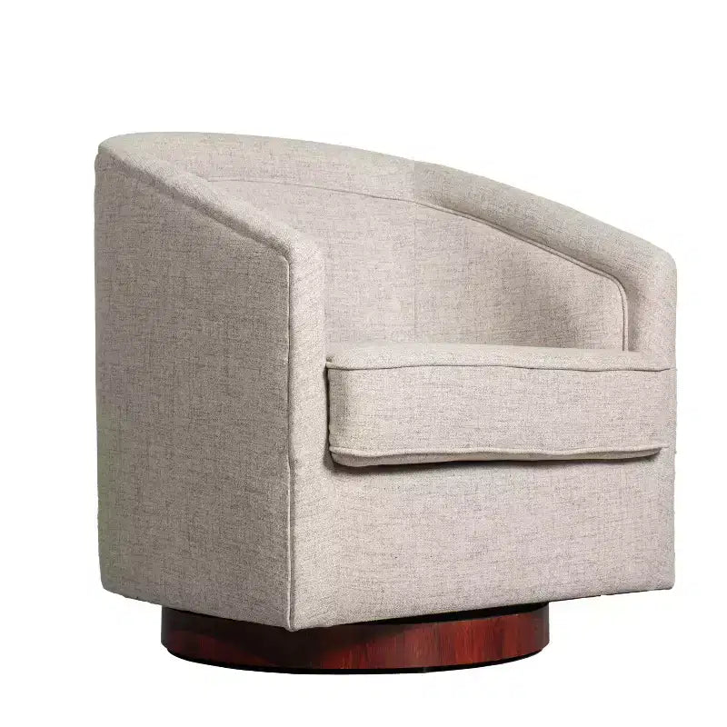 Fauteuil crapaud pivotant et capitonné