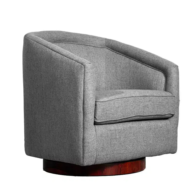 Fauteuil crapaud pivotant et capitonné