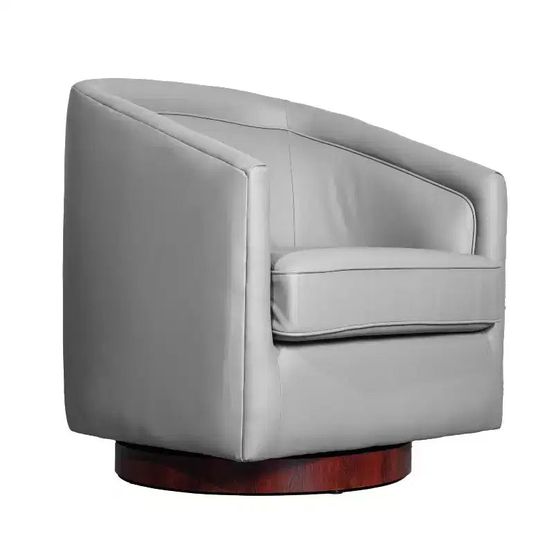 Fauteuil crapaud pivotant et capitonné