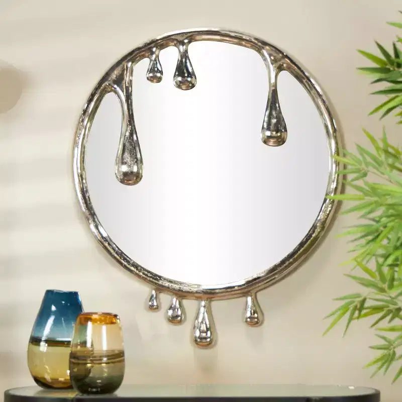 Miroir mural abstrait en aluminium 43x36 avec cadre au design fondu